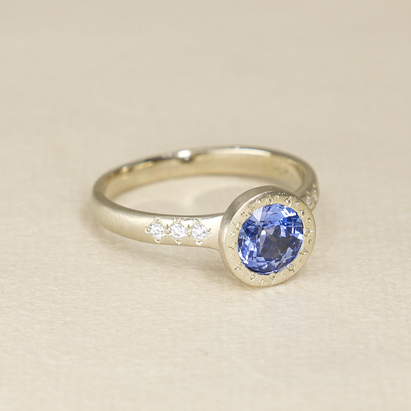 Blue Sapphire Engraved Bezel Ring